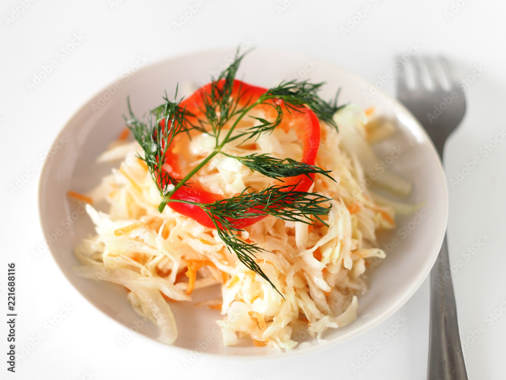 rustic salad with sauerkraut and pepper and onions