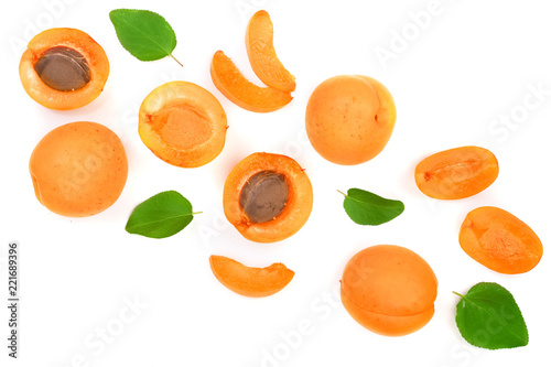 Apricot fruits with leaves isolated on white background with copy space for your text. Top view. Flat lay pattern