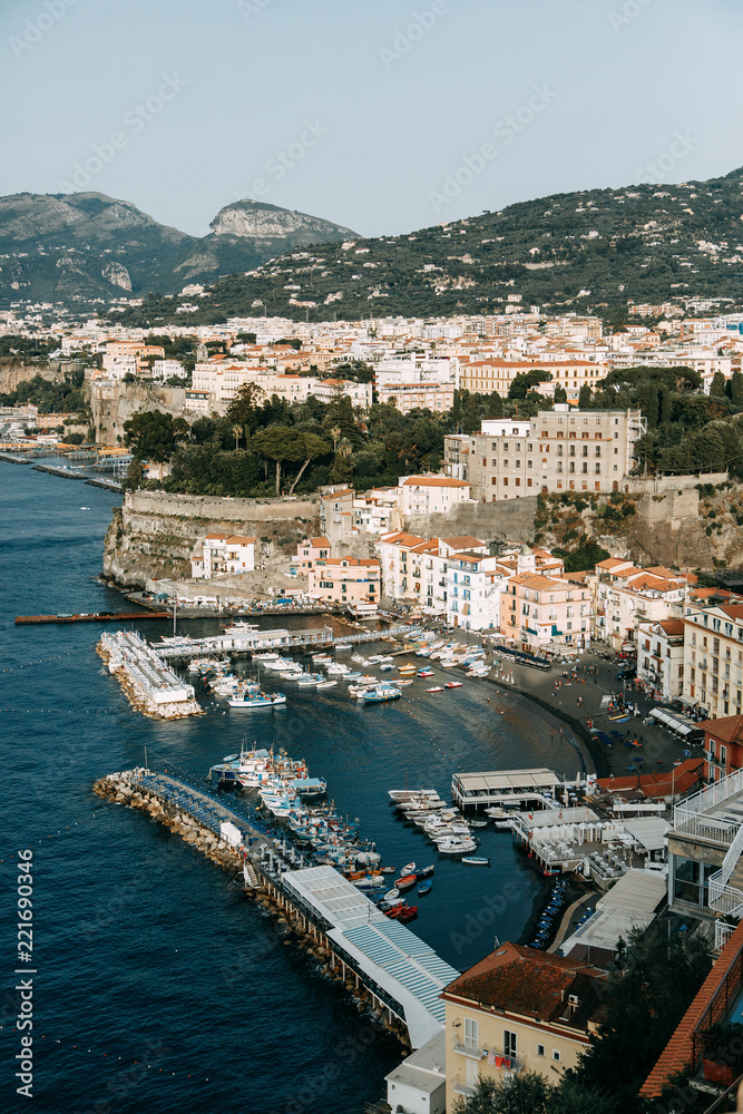 Views of the city of Sorrento in Italy, panorama and top view. Night and day, the streets and the coast. Beautiful landscape and brick roofs. Architecture and monuments of antiquity.