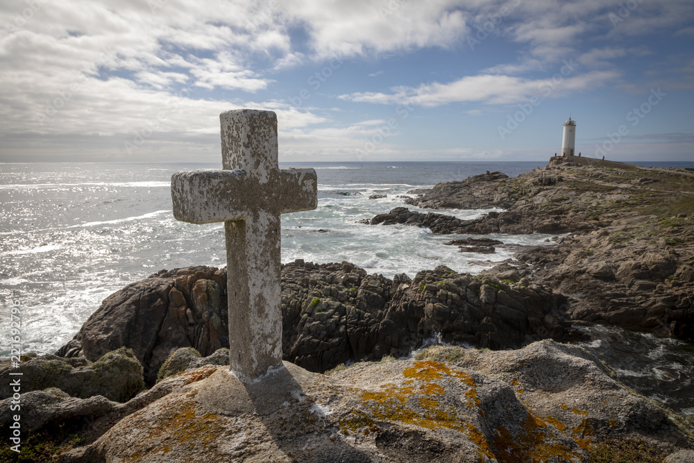 memorial cross for lost fishermen on Cape Roncudo (Faro de Cabo Roncudo) on the coast of death (costa da more ) in galicia, spain