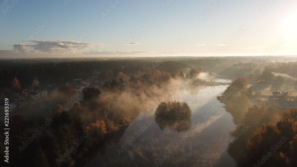 Fototapeta premium Morning smoke on the water Ulbroka lake Aerial drone top view Latvia