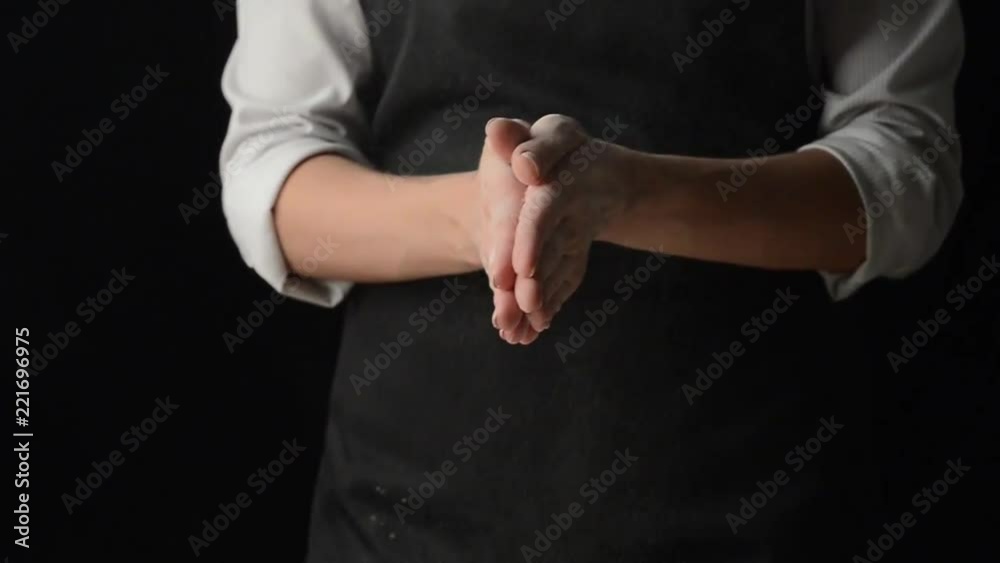 Chef hands in flour on a black background banner. Making pizza, pasta, baking bread and sweets Chef hands in flour on a black background banner. Making pizza, pasta, baking bread and sweets