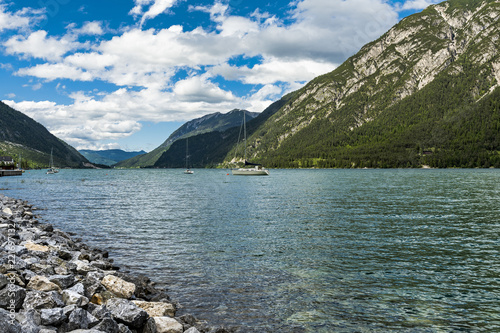 The beautiful Lake Achen. The highest lake in the Austrian Tyrol and lies north of Jenback. Has a maximum depth of 133m and rarely does the temperature rise above 20C, but ideal for windsurfing. photo