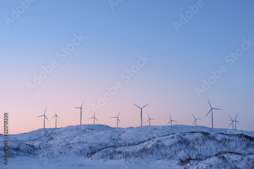 View at the wind turbines farm in Norway in winter.