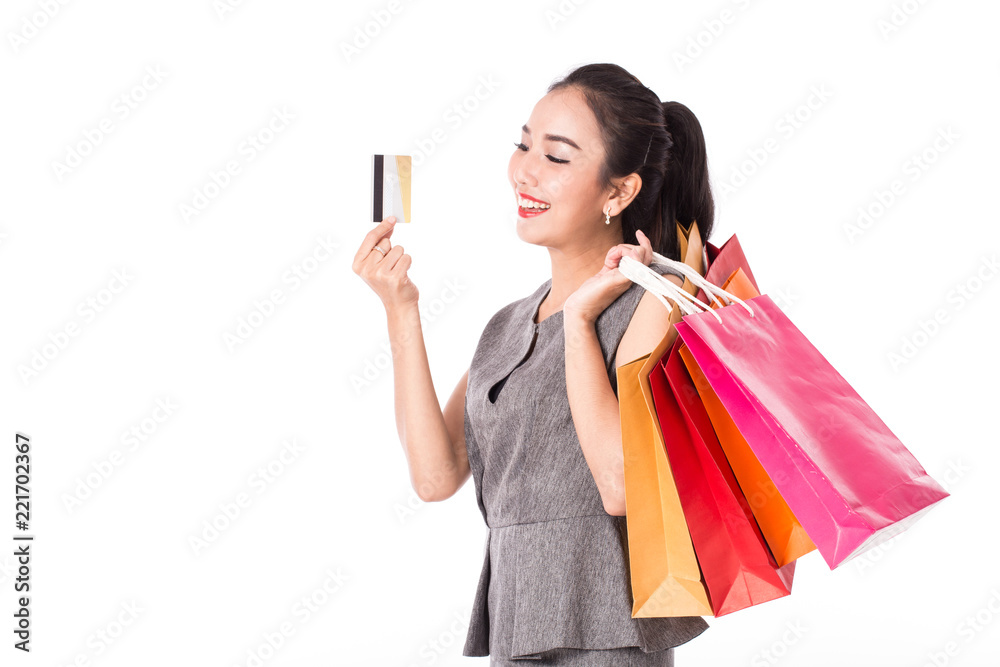 Beautiful Attractive Asian woman holding credit card and shopping bags feeling so proud and happiness enjoy with black Friday sale,Isolated on white background,Shopping Concept Beautiful Attractive Asian woman holding credit card and shopping bags feeling so proud and happiness enjoy with black Friday sale,Isolated on white background,Shopping Concept
