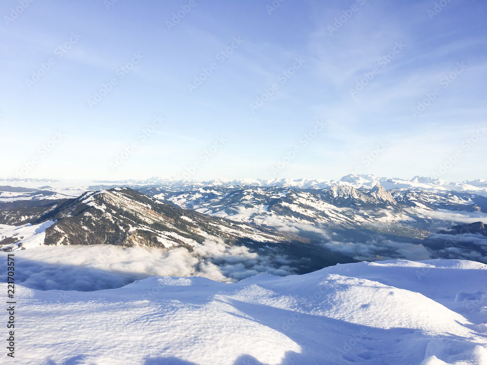 Landscape and nature at Grindelwald valley with clouds,blue sky and snow covered in winter season alpine Switzerland.