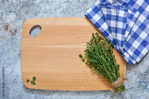 Mix of peppers and thyme on a concrete background. Food background with space for text. Advertising. photo