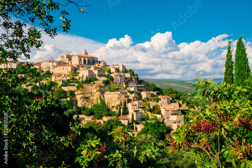 Panoramic view of Gordes, a small medieval town in Provence, France. A view of the ledges of the roof of this beautiful village. photo