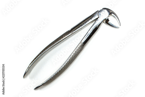 Working real dental forceps from dental equipment tools. isolated on white background