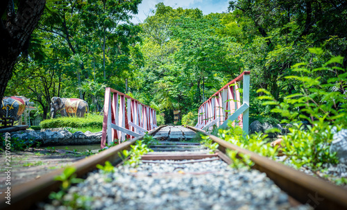 Railroad tracks through the park