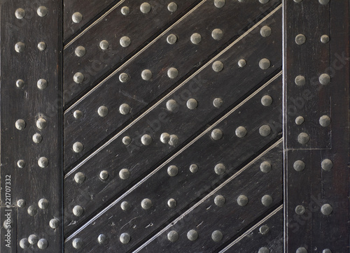 Texture of wooden slats and rivets