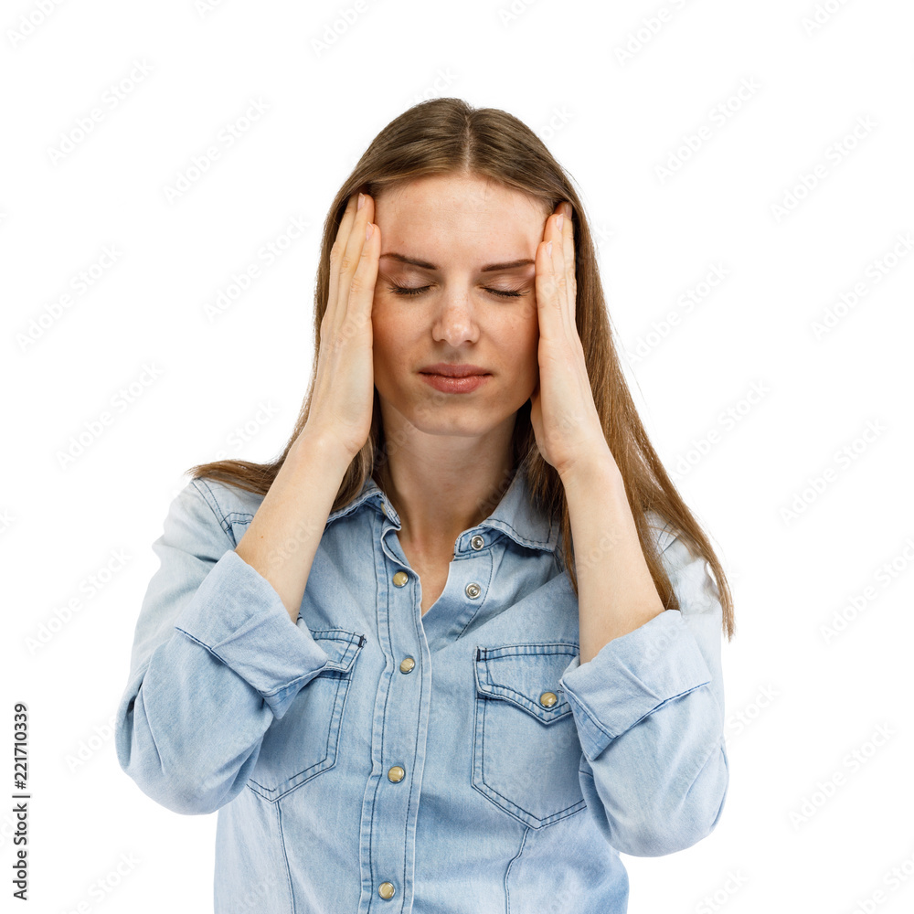 Woman massaging pain head Woman massaging pain head