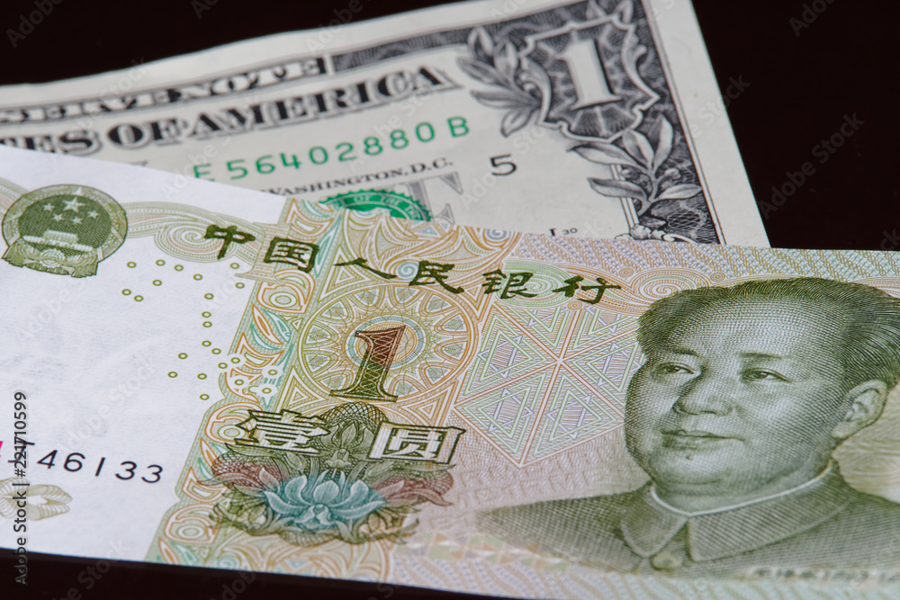 One chinese yuan banknote is above one american dollar