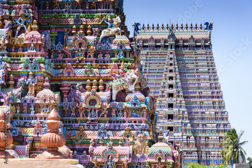 Gopurams in Sri Ranganathaswamy Temple, India. A Gopuram is a monumental gatehouse tower, usually ornate, at the entrance of a Hindu temple usually found in the southern India photo