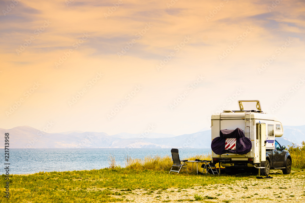 Fototapeta premium Camper car on beach. Travel