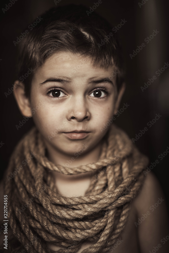 Heavy slave labor exploitation of children, heavy tired look of hopelessness Heavy slave labor exploitation of children, heavy tired look of hopelessness
