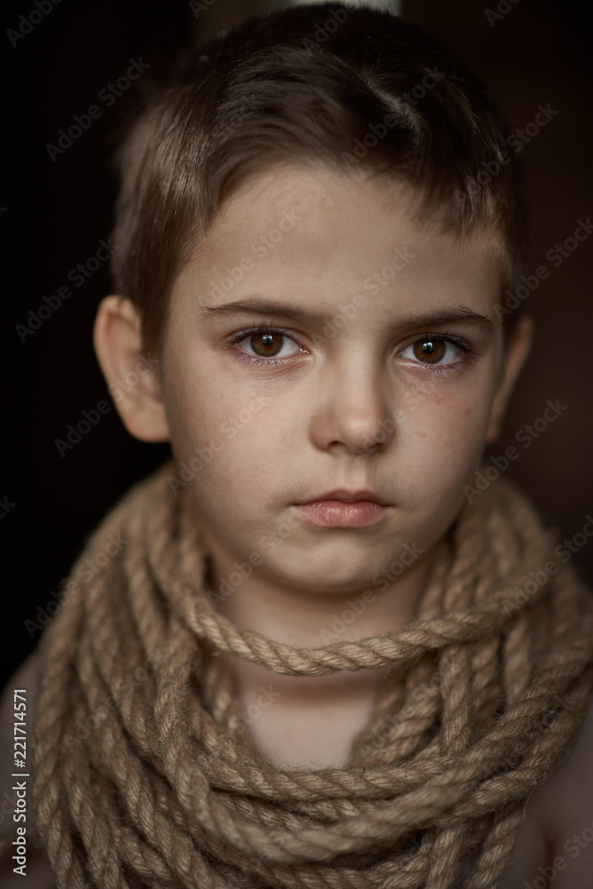 Heavy slave labor exploitation of children, heavy tired look of hopelessness Heavy slave labor exploitation of children, heavy tired look of hopelessness
