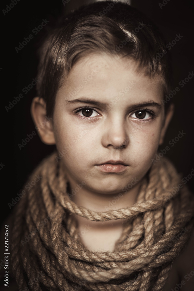 Heavy slave labor exploitation of children, heavy tired look of hopelessness