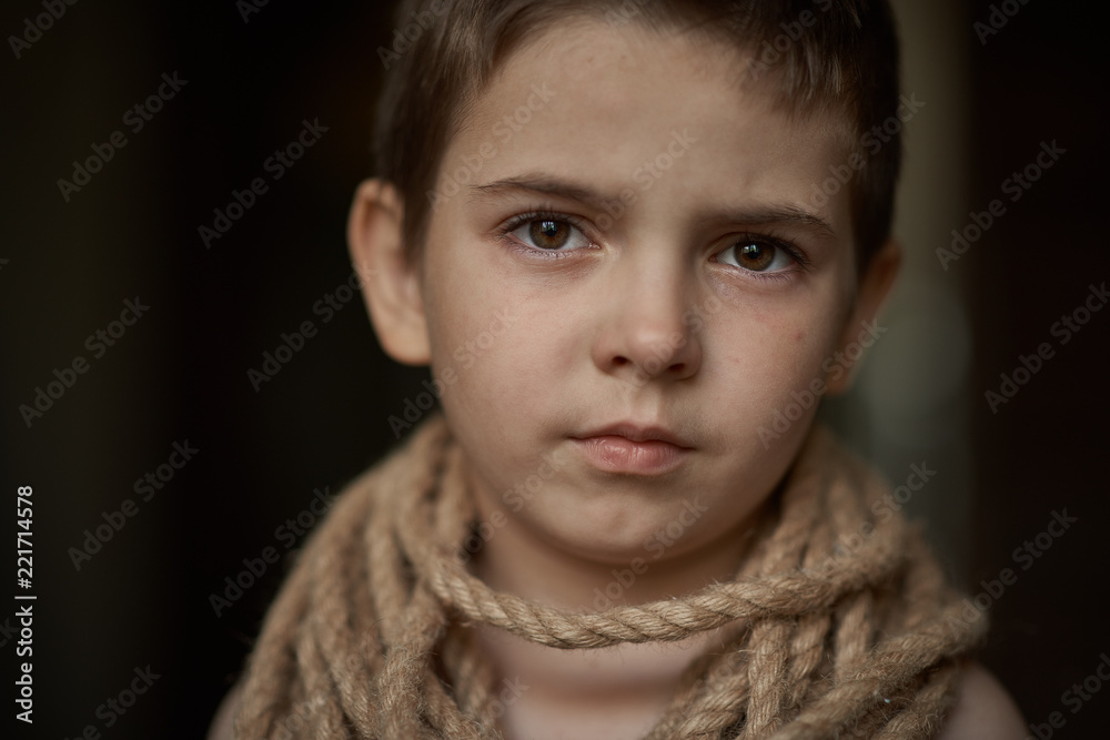 Heavy slave labor exploitation of children, heavy tired look of hopelessness Heavy slave labor exploitation of children, heavy tired look of hopelessness