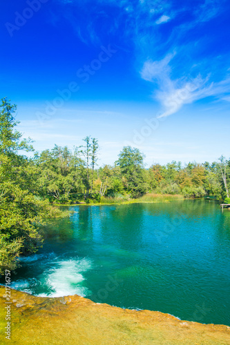 Fototapeta Naklejka Na Ścianę i Meble -  Mreznica river in Belavici village, Karlovac county, Croatia, waterfall and green nature