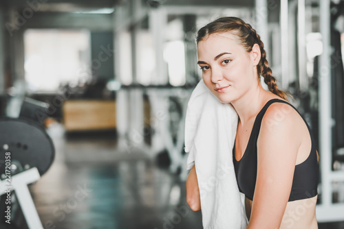 woman rest in gym after workout