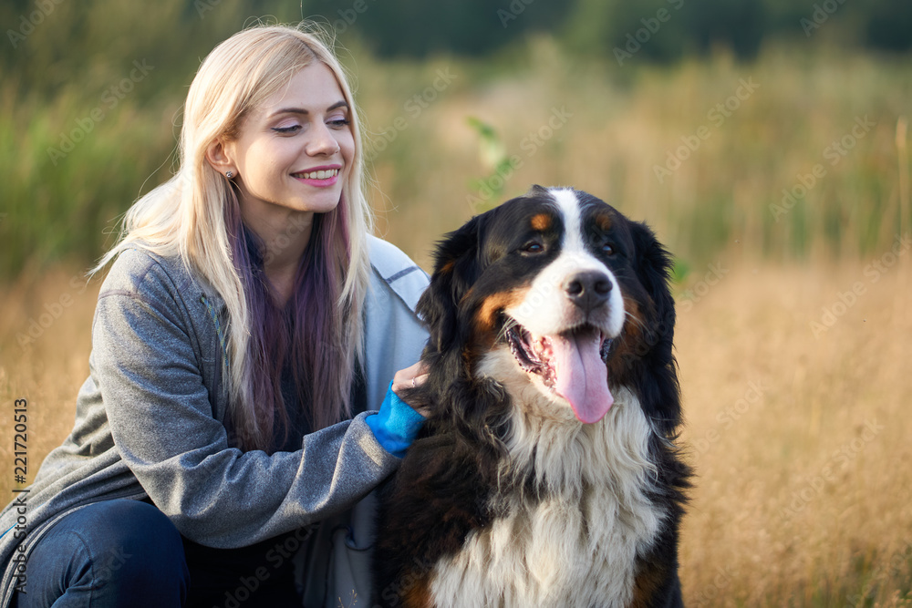 portrait of a girl with a dog big on nature portrait of a girl with a dog big on nature