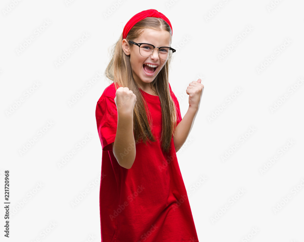 Young beautiful girl wearing glasses over isolated background very happy and excited doing winner gesture with arms raised, smiling and screaming for success. Celebration concept. Young beautiful girl wearing glasses over isolated background very happy and excited doing winner gesture with arms raised, smiling and screaming for success. Celebration concept.