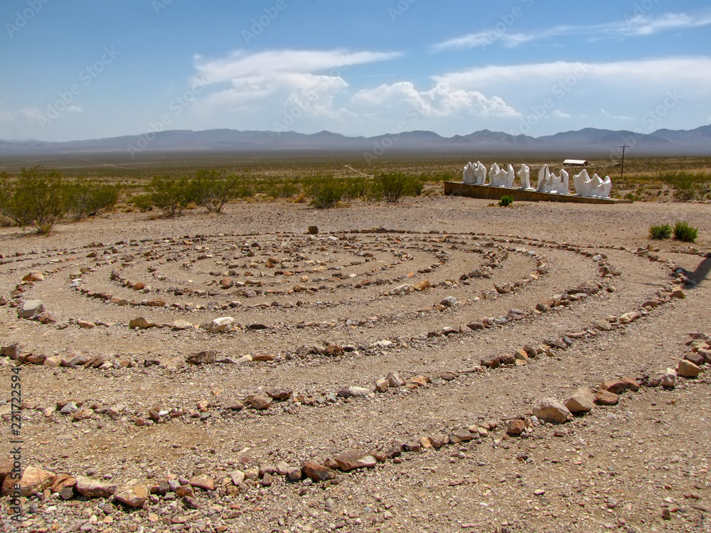 White ghosts and stones laid out in circuleren, Rhyolite ghost town, Death Valley, Nevada, USA