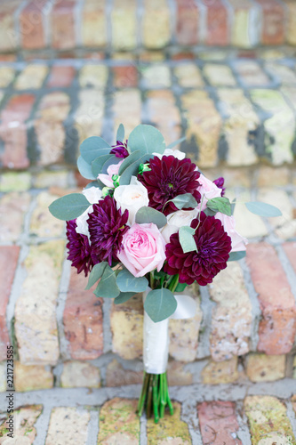Red and Pink Rose Bouquet on Pastel Brick Stairs
