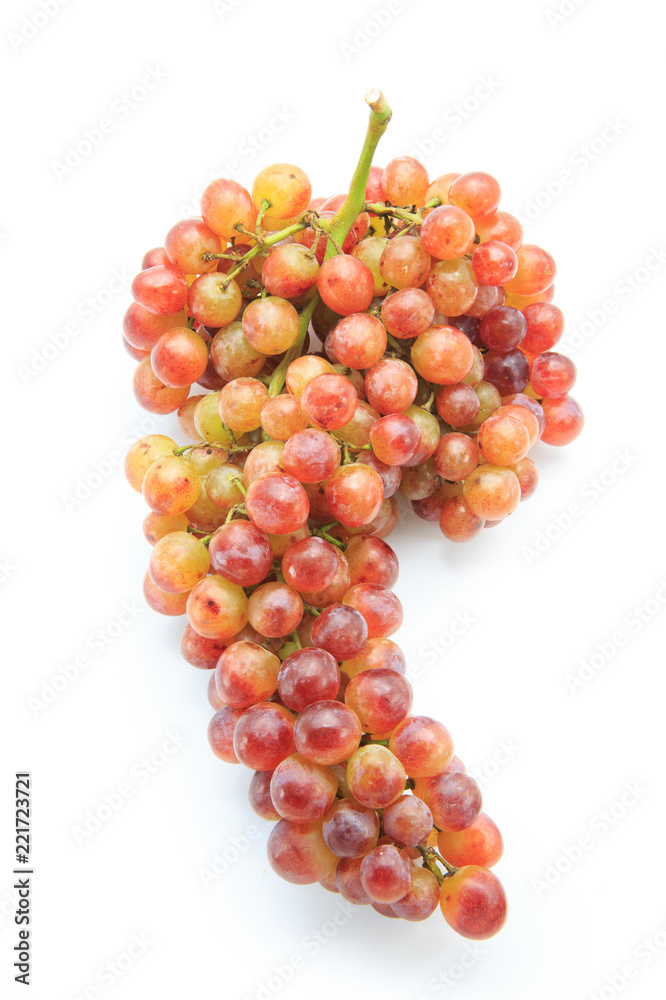 Ripe red grape. Pink bunch isolated on white.