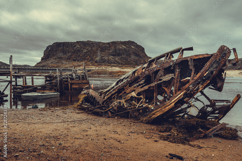 Old wooden boat in Teriberka, Murmansk region Old wooden boat in Teriberka, Murmansk region