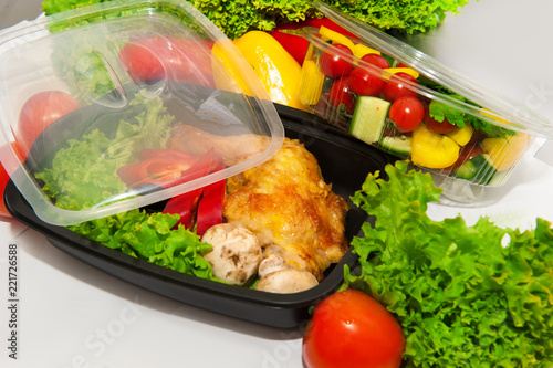 Chicken with lettuce and vegetables in lunchbox