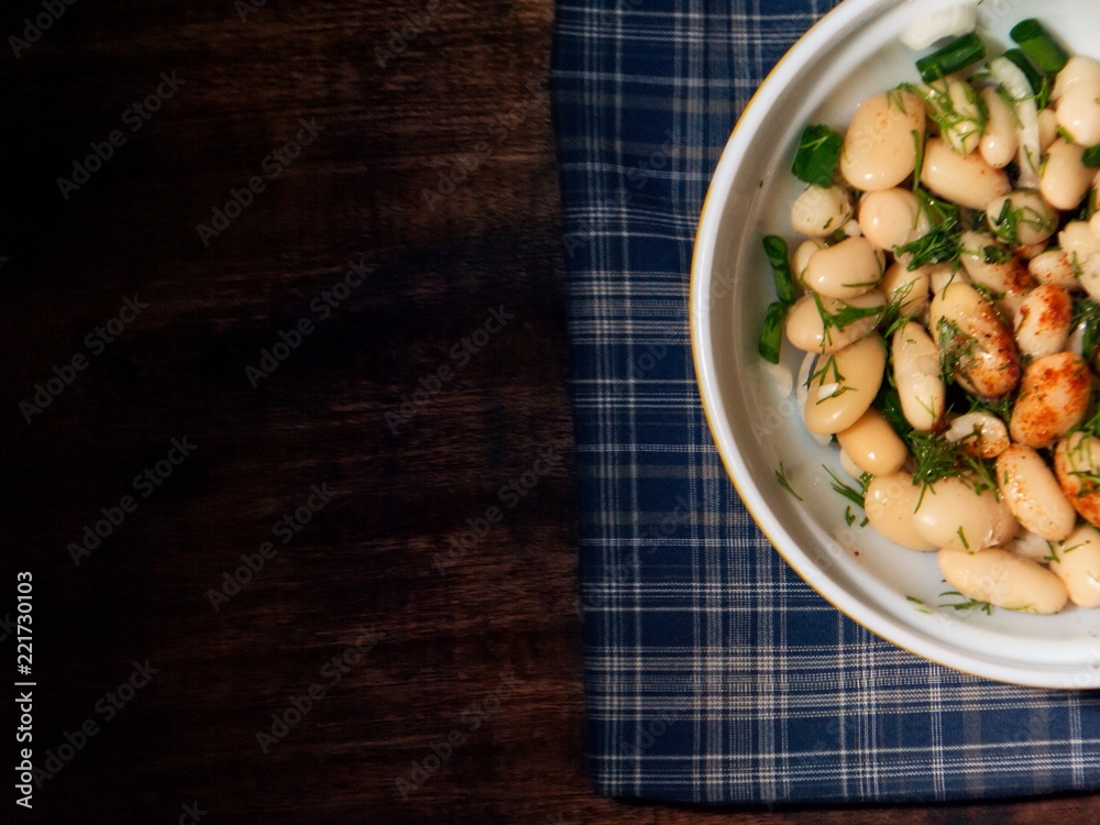 Salad from boiled string beans. Salad on the table.