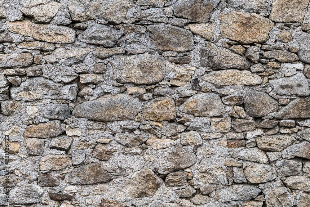 Stone masonry texture, Old retaining masonry of different size stone backgrounds Stone masonry texture, Old retaining masonry of different size stone backgrounds