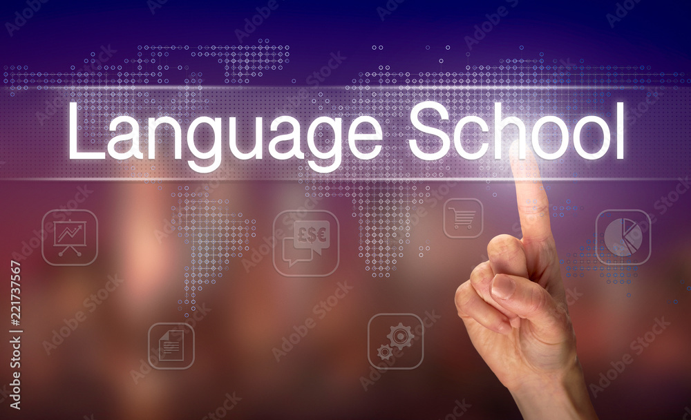 A hand selecting a Language School business concept on a clear screen with a colorful blurred background.