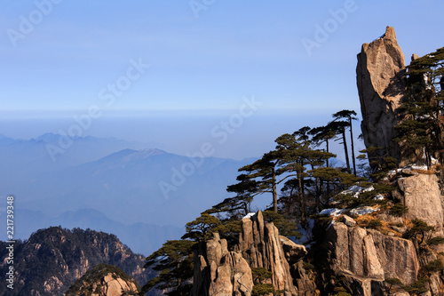 Huangshan China National Park - Anhui Province, Chinese Mountain Peak. Sea of Fog, Yellow Granite Mountains with Canyon, Exotic Pine Trees and Forest, Jagged Cliffs, UNESCO World Heritage Site