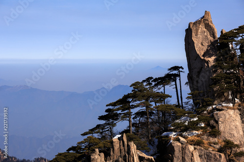 Huangshan China National Park - Anhui Province, Chinese Mountain Peak. Sea of Fog, Yellow Granite Mountains with Canyon, Exotic Pine Trees and Forest, Jagged Cliffs, UNESCO World Heritage Site