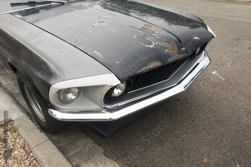 A view of a vintage classic American muscle car in the street in California