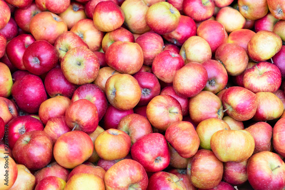 red ripe fall apples background in wooden boxes at street market red ripe fall apples background in wooden boxes at street market