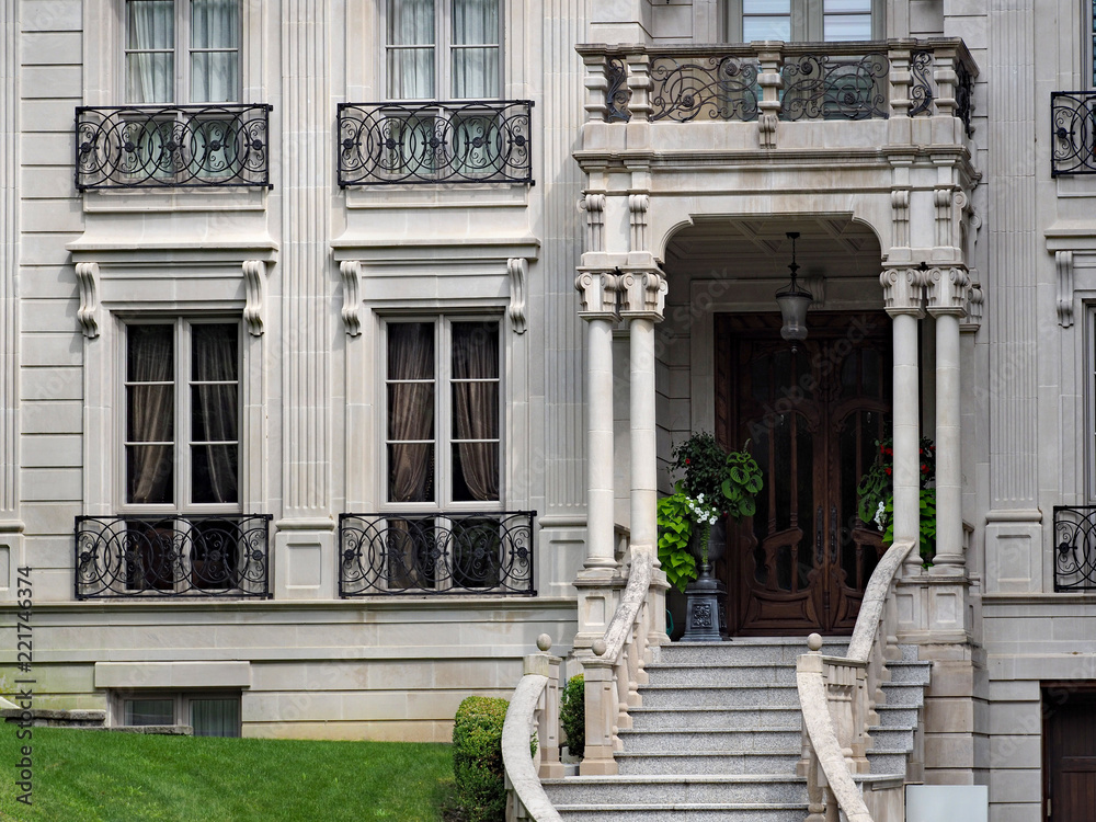 Fototapeta premium European 19th century style architecture, entrance to large house or apartment building