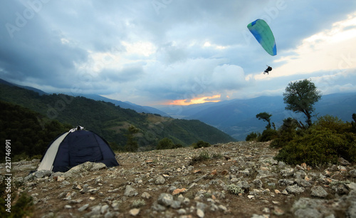 Camping Tent and Paraglider at the Summit