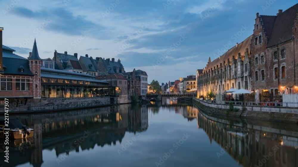 Pan motion timelapse video of the beautiful cityscape and Leie river from afternoon to sunset at Ghent, Belgium Pan motion timelapse video of the beautiful cityscape and Leie river from afternoon to sunset at Ghent, Belgium