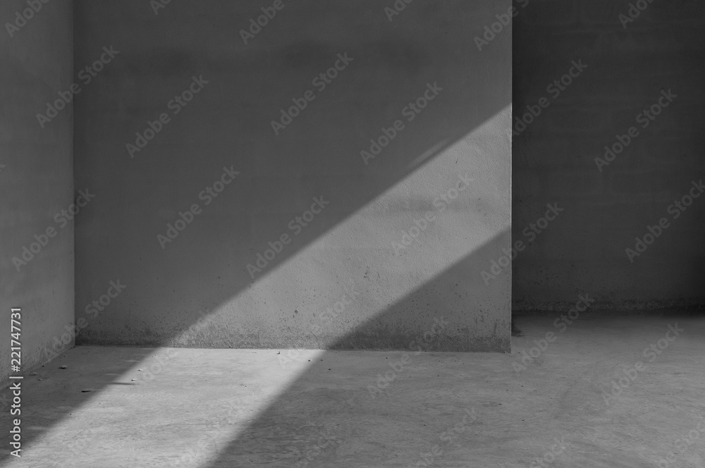 Grungy concrete wall and stone floor room as background,Abstract architecture background Grungy concrete wall and stone floor room as background,Abstract architecture background
