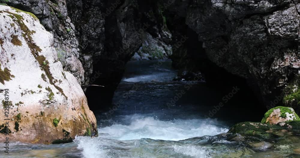 Gorge detail with rocky mountain river, Kamnik Bistrica, Slovenia. Dolly slider equipment and slow motion used. Gorge detail with rocky mountain river, Kamnik Bistrica, Slovenia. Dolly slider equipment and slow motion used.