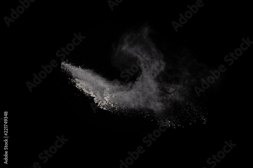 White powder explosion on white background. Colored cloud. Colorful dust explode. Paint Holi.