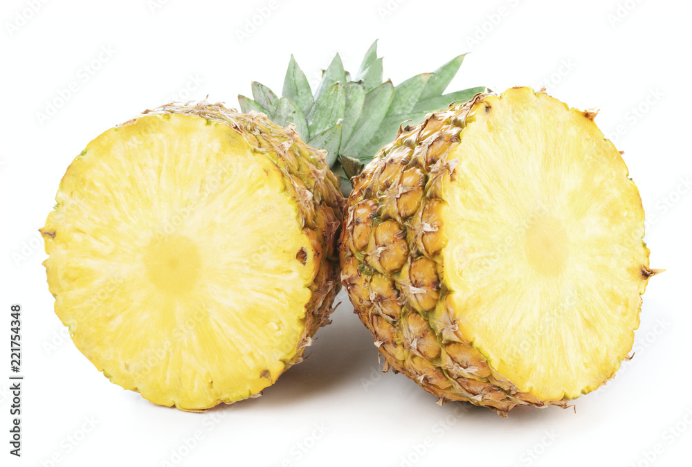 two halves of ripe pineapple fruit isolated on white background two halves of ripe pineapple fruit isolated on white background