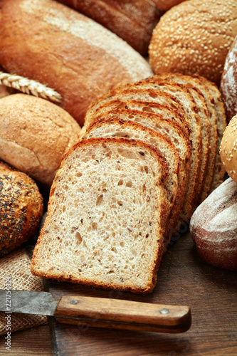 sliced fresh baked bread isolated on white background