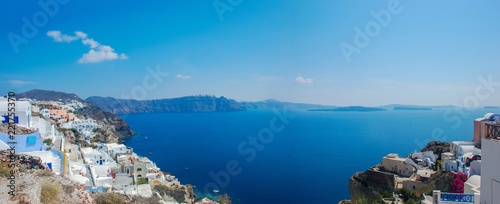 Panoramic view of the stunning blue Mediterranean Sea and Caldera of Santorini in the Greek Islands