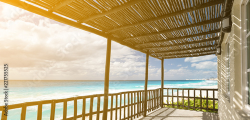 Fototapeta Naklejka Na Ścianę i Meble -  Tropical wooden terrace near caribbean sea