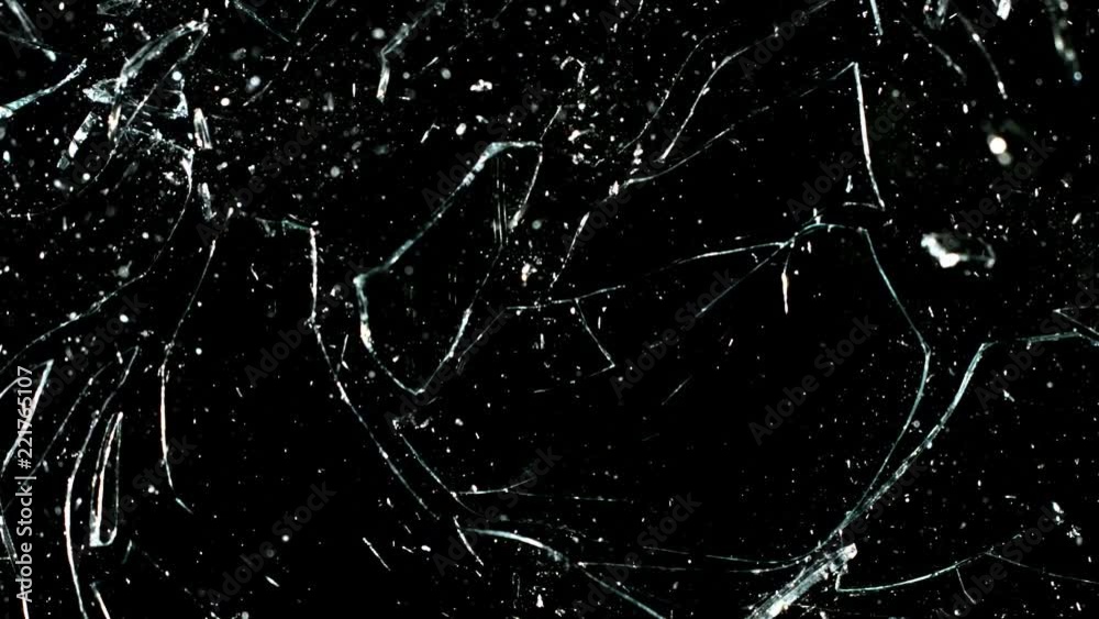 Real glass break in super slow motion shooted with high speed cinema camera at 2000 fps. Isolated on black.